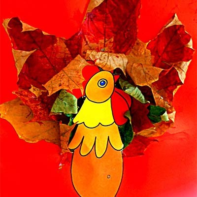 Аппликация из осенних листьев Золотой петушок